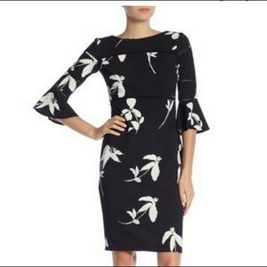 Classic black and white dress with bell sleeves